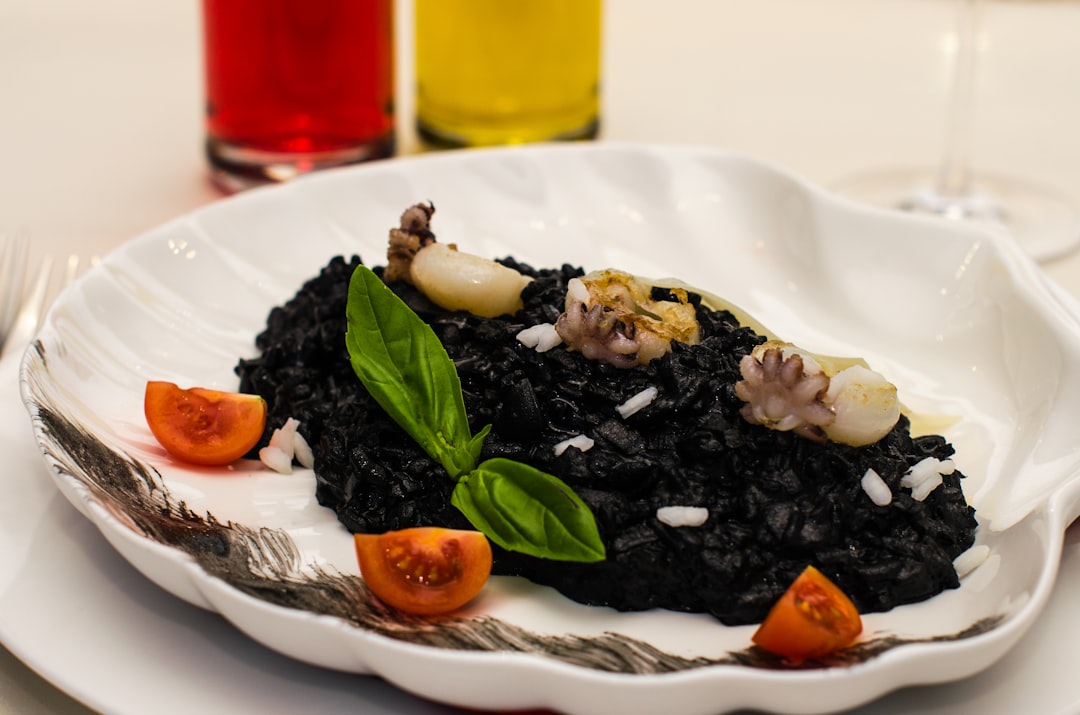 Kotor Montenegro crni rizot black risotto seafood dish plate
