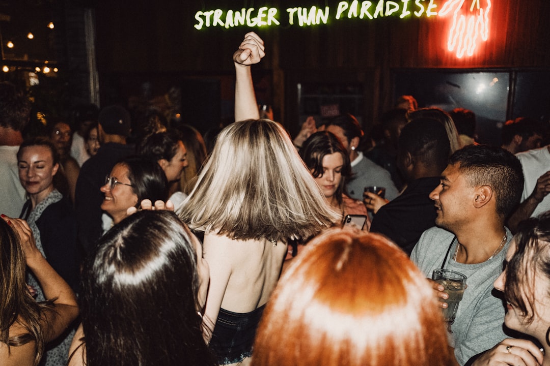 Bar Shadervan Prizren interior neon lights crowd dancing