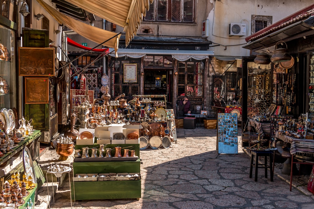 Traditional kafana Sarajevo outdoor seating rakija bottles