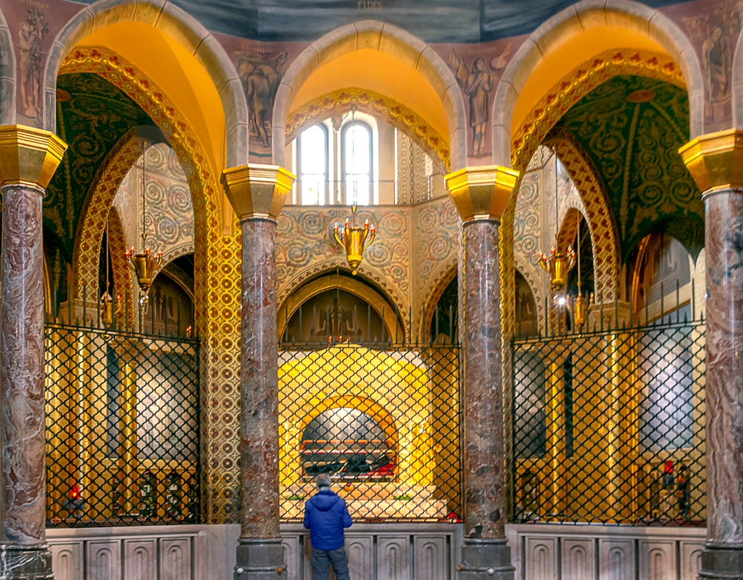Rila Monastery Main Church interior frescoes gold light