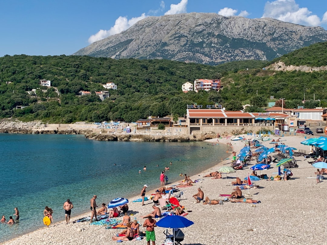 Velika Plaza Beach Montenegro crowded pebble beach bars restaurants summer