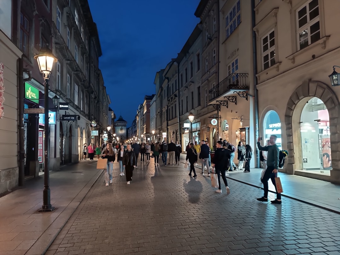 Kotor Stradun street bars evening lights people