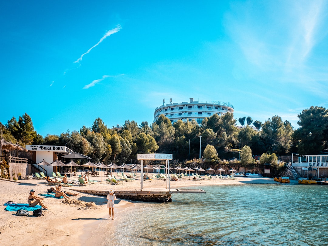 Ksamil Beach 1 Albania white shell sand turquoise water sunbeds