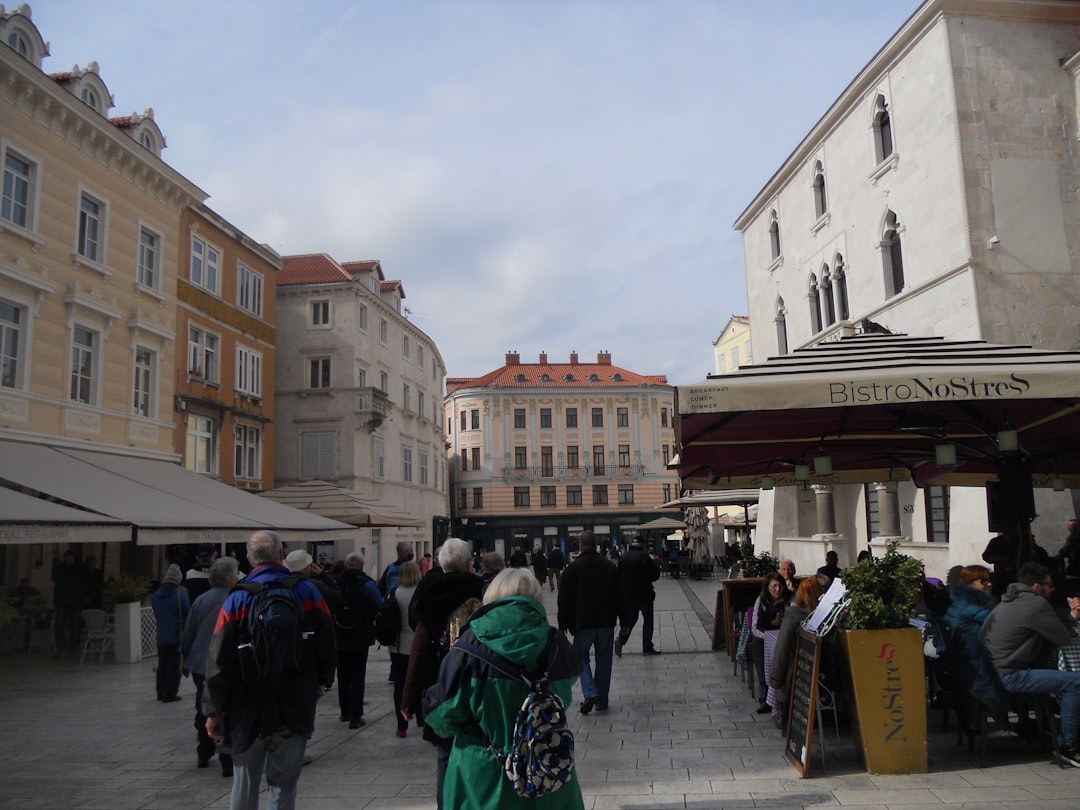 Gospić Croatia town square evening lights bars