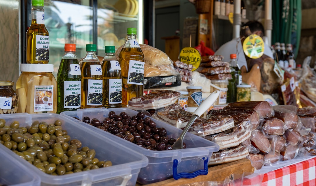 Kotor Old Town street food cevapi bread onions local tavern